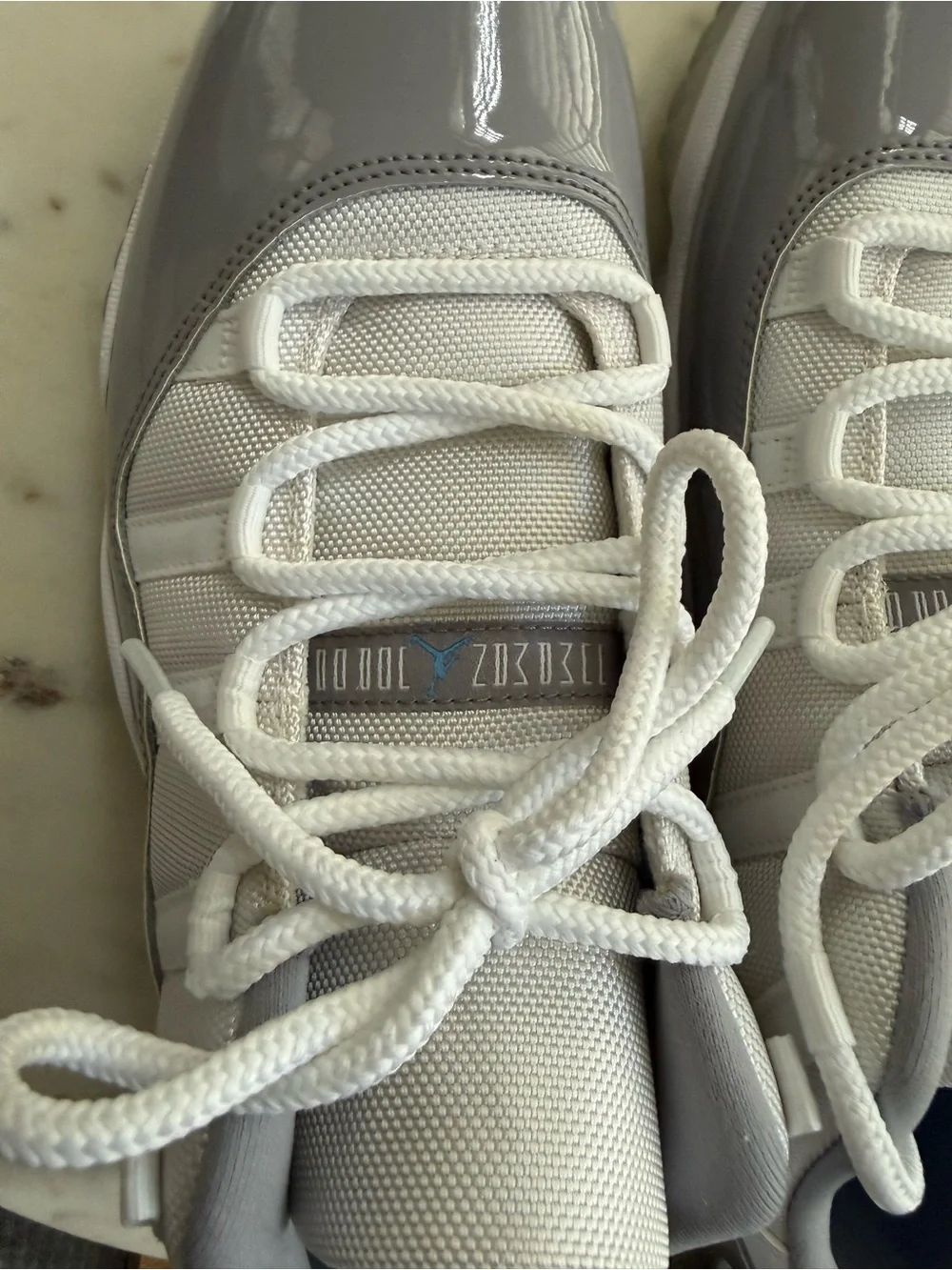 Jordan Men’s Low Top Athletic Shoes in White and Gray Patent